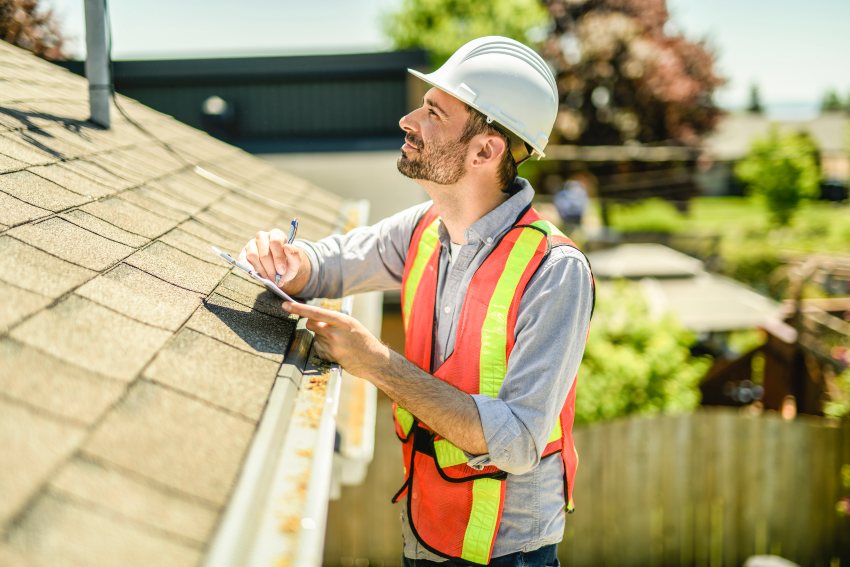 Knox Roofing professional conducting residential roof inspection in Santa Cruz & Monterey Counties